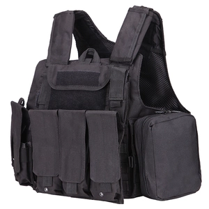 Detail view of tactical vest showing three magazine pouches and breathable mesh interior