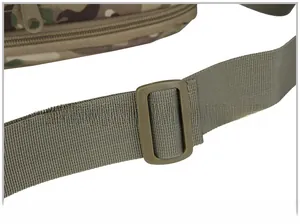 Detail of adjustable tactical shoulder strap with durable buckle on camo bag