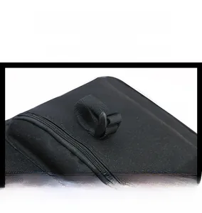 Detail of durable black nylon tactical bag featuring adjustable straps and buckle