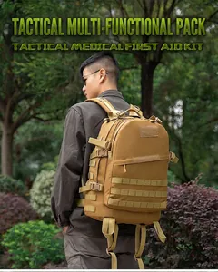 Detail of khaki tactical first aid kit with MOLLE webbing for outdoor hiking gear