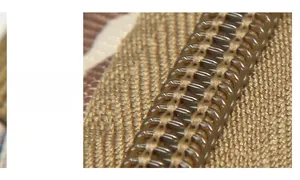 Dettaglio della robusta cerniera in plastica su borsa tattica kaki da esterno