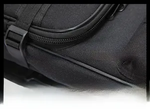 Detailed macro view of reinforced edge frame and durable nylon fabric on tactical bag
