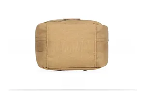 Bottom view of tactical waist bag in khaki canvas with metal drainage hole detail