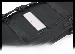 Detail of the hidden anti-theft back pocket showing its capacity for a tablet device