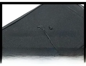 Detailed view of 800D high-density nylon fabric with waterproof water droplets