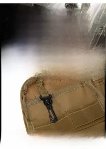 Internal view of tactical pouch featuring a durable plastic swivel hook for securing keys