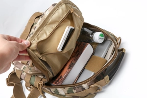 Internal view of tactical camouflage chest bag showing multi-pocket storage and large capacity