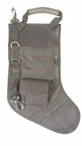 Close-up of tactical Christmas stocking featuring Molle system and rubber carry handle