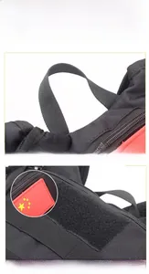 Detail view of the heavy-duty reinforced top handle and Velcro panel on the tactical backpack