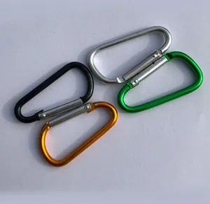 Macro view of multi-color aluminum D-ring carabiners with spring-loaded locks