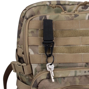 Detail of tactical nylon Molle hook with metal eagle beak clip on a camouflage backpack