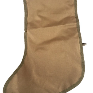 Tactical Christmas stocking in tan durable nylon with military webbing for outdoor decor