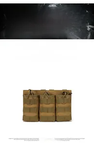 Macro detail of triple mag pouch with MOLLE webbing and elastic cord in khaki tan