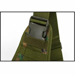 Detail of army green nylon webbing with camo pattern and durable plastic buckle
