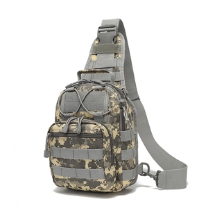 Close-up of tactical shoulder bag featuring digital camo pattern and MOLLE webbing system
