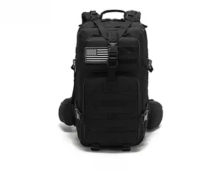 Front view of black tactical backpack with MOLLE system and US flag patch