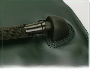 Detail view of the detachable leak-proof connector with braided protection for hydration bags