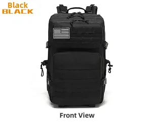 Detail view of black tactical backpack with MOLLE system and American flag patch