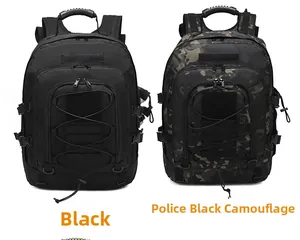Detail of waterproof tactical backpacks in black and camo with MOLLE system and top handles