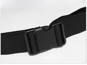 Close-up of durable black plastic buckle and reinforced nylon webbing for tactical backpack
