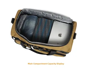 Top view showing the large capacity of the khaki tactical gym bag with daily items