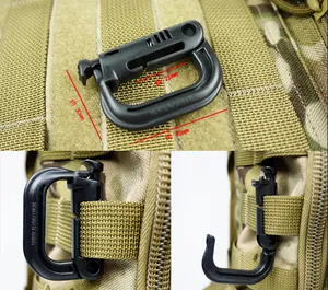 Detailed macro view showing dimensions and MOLLE strap attachment of the black tactical D-ring