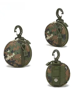 Detail of digital camouflage tactical pouch with D-ring hook and MOLLE webbing system