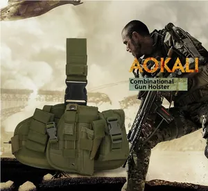 Detail view of military green tactical leg holster set with adjustable molle pouches