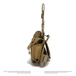 Close-up of khaki tactical drop leg bag with MOLLE system and quick-release buckle