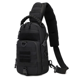 Detail view of tactical chest bag showing MOLLE webbing and woven paracord handle