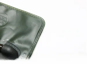 Close-up of dual-layer welding process and logo embossing on army green 3L TPU water bladder