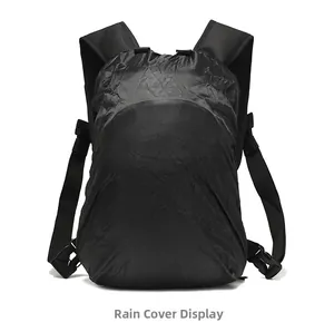 Detailed view of the black hiking backpack equipped with a waterproof rain cover