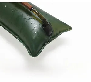 Detail of food-grade TPU hydration bladder with scale marks and detachable hose