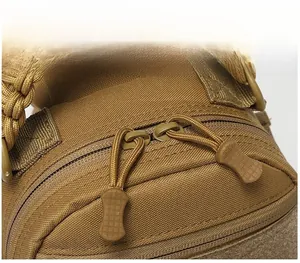 Detailed close-up of tactical nylon fabric and durable paracord zipper pulls on the chest bag