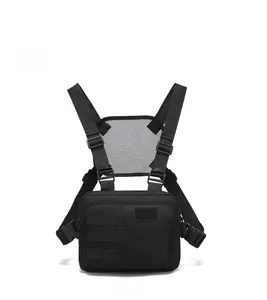 Front view of black tactical chest rig with MOLLE webbing and breathable mesh fabric