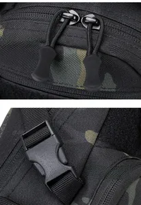 Detail of durable dual-zipper system and robust plastic buckle on camouflage tactical bag