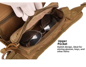 Detail view of khaki tactical leg bag upper pocket showing storage for sunglasses and keys