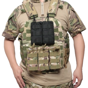 Tactical vest with MOLLE system featuring black and multicam magazine pouches