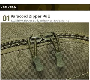 Close-up of military green backpack showing dual zippers and paracord pulls on nylon fabric
