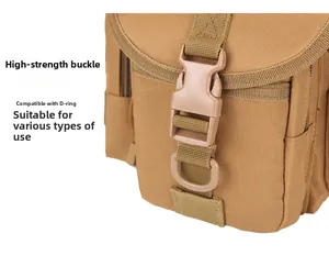 Detail of khaki tactical bag showing heavy-duty plastic buckle and metal D-ring attachment
