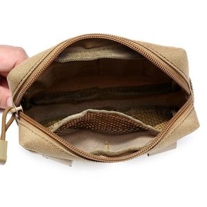 Macro view of multi-layer storage interior in khaki tactical nylon EDC pouch