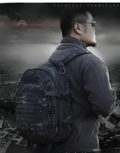 Tactical backpack with dark camouflage and laser-cut Molle system on back of male model