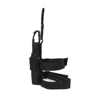 Tactical black nylon thigh holster with adjustable straps and quick-release buckles