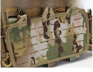 Detail of laser-cut MOLLE system and quick-release buckle on camo tactical vest