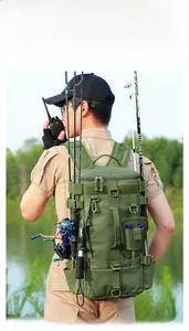 Tactical fishing backpack in olive green showing side rod holders with three fishing rods
