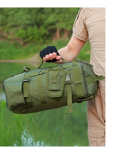 Army green tactical fishing bag with MOLLE webbing system and durable handle