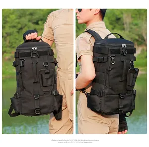Tactical black fishing backpack with MOLLE system and adjustable straps in outdoor water setting