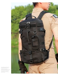 Detail showing the tactical MOLLE system and high-density fabric of the black fishing backpack