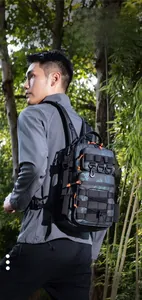 Outdoor camouflage tactical backpack for hiking and commuting in forest scenery