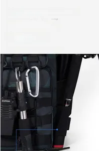Detail showing adjustable gear straps and D-rings for outdoor camouflage backpack